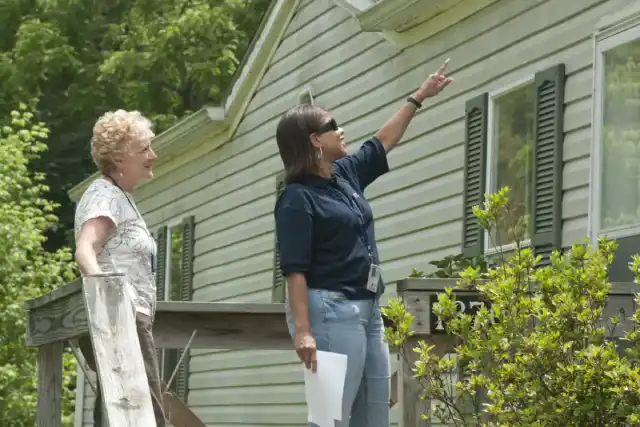A home inspector examining a residential property